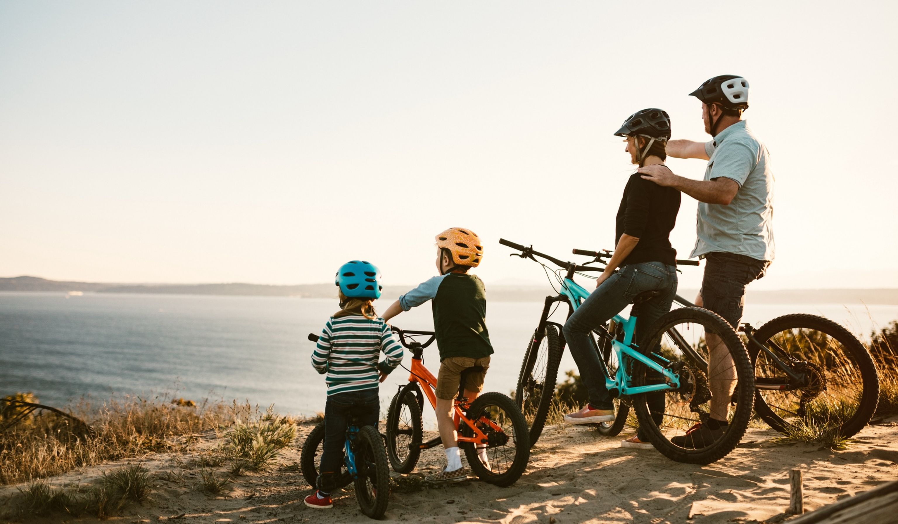 Family biking on scenic trails in San Diego