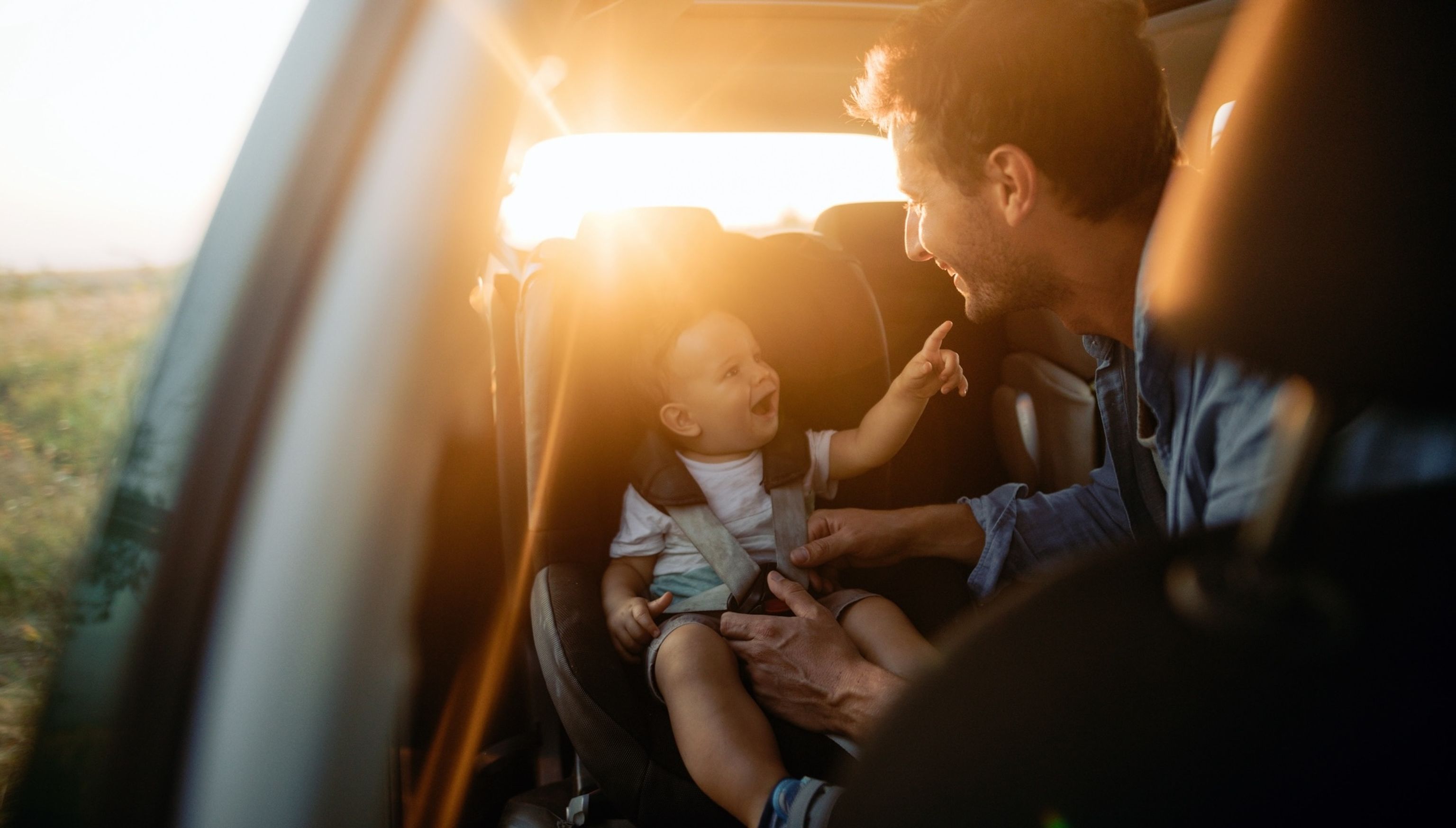 Family enjoying a long drive with essential tips