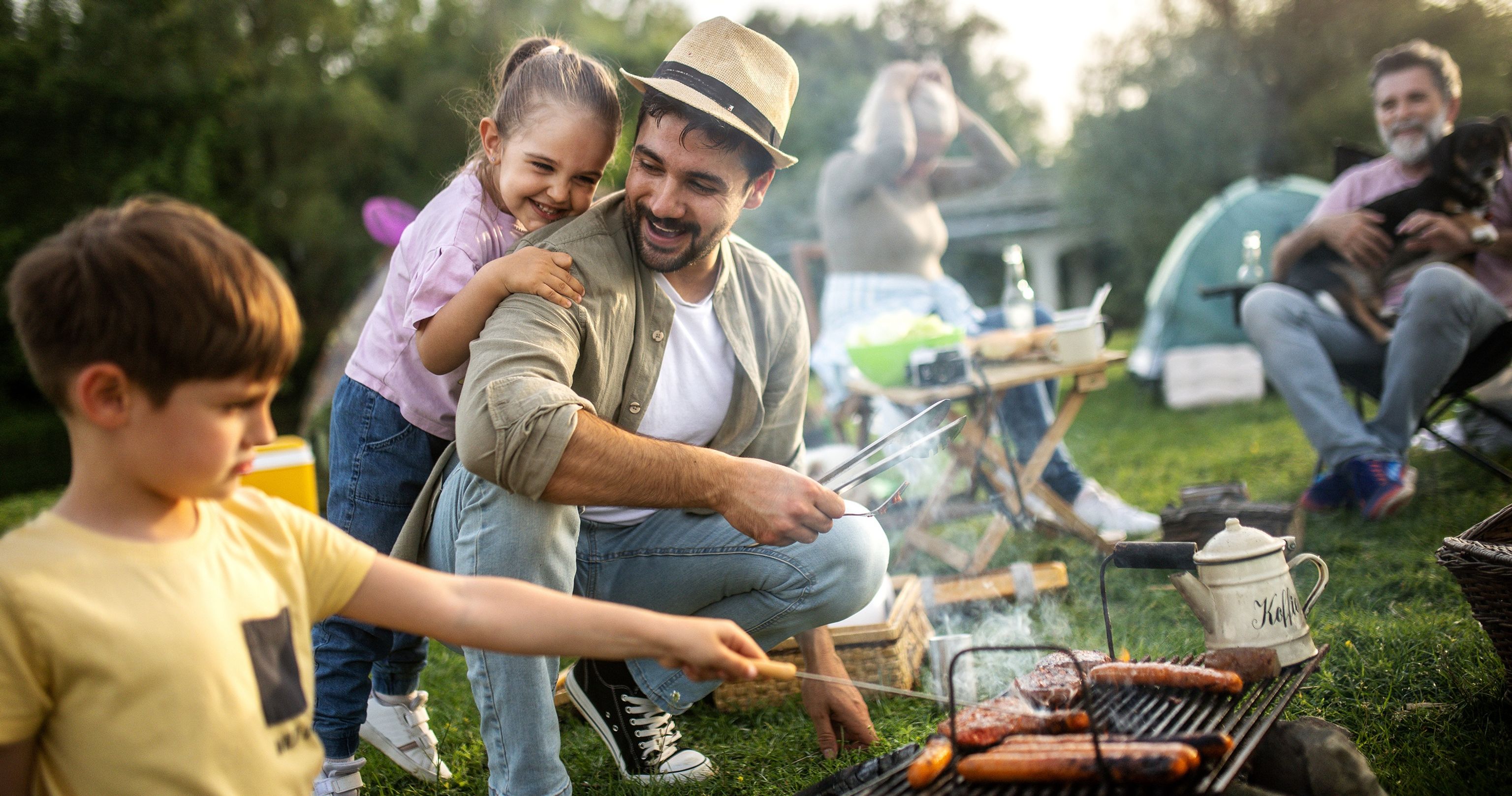 Family enjoying picnic and BBQ in San Diego