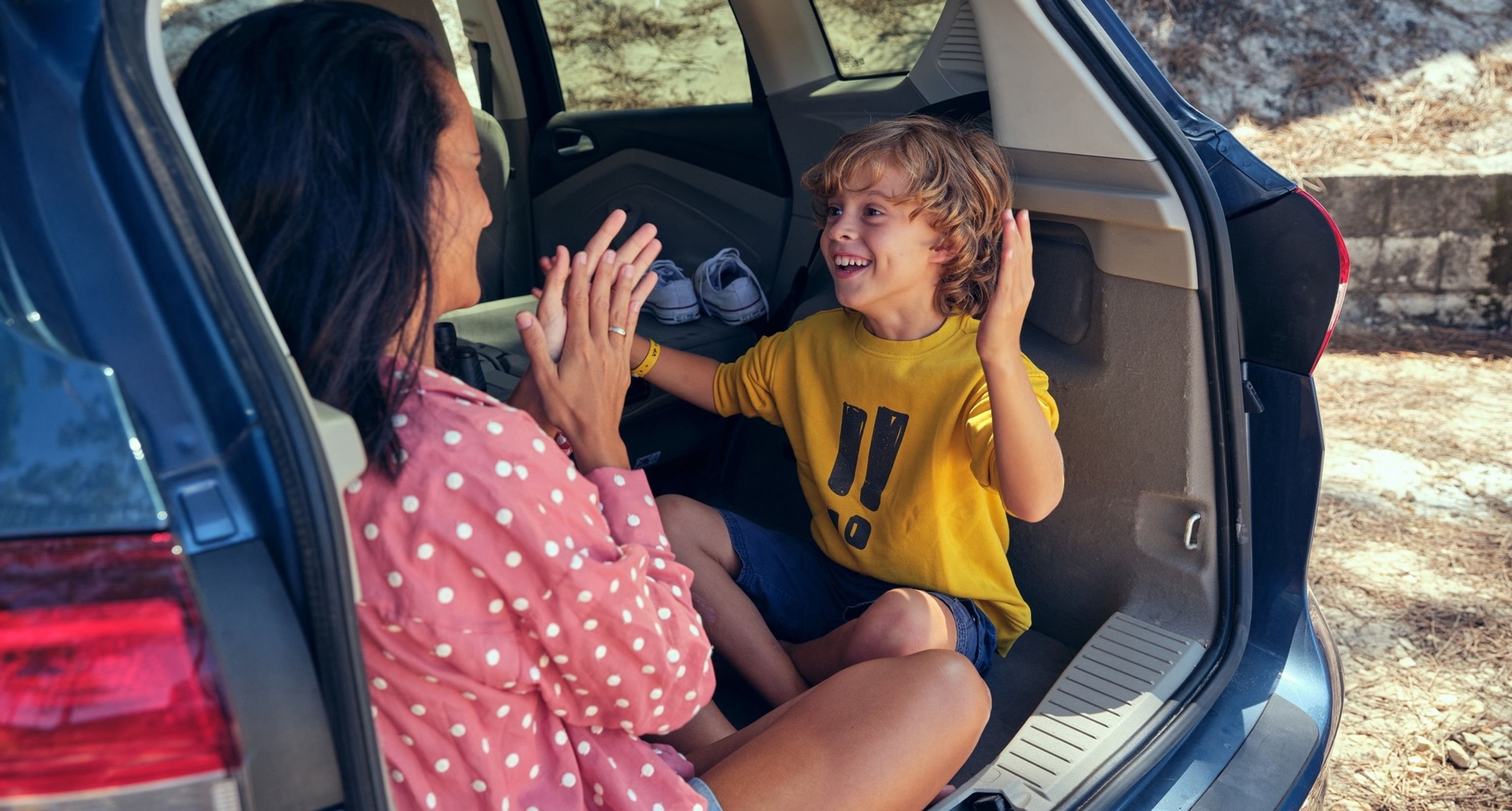 Family enjoying road trip games and activities